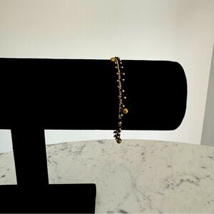 Steampunk brass and black beaded bracelet